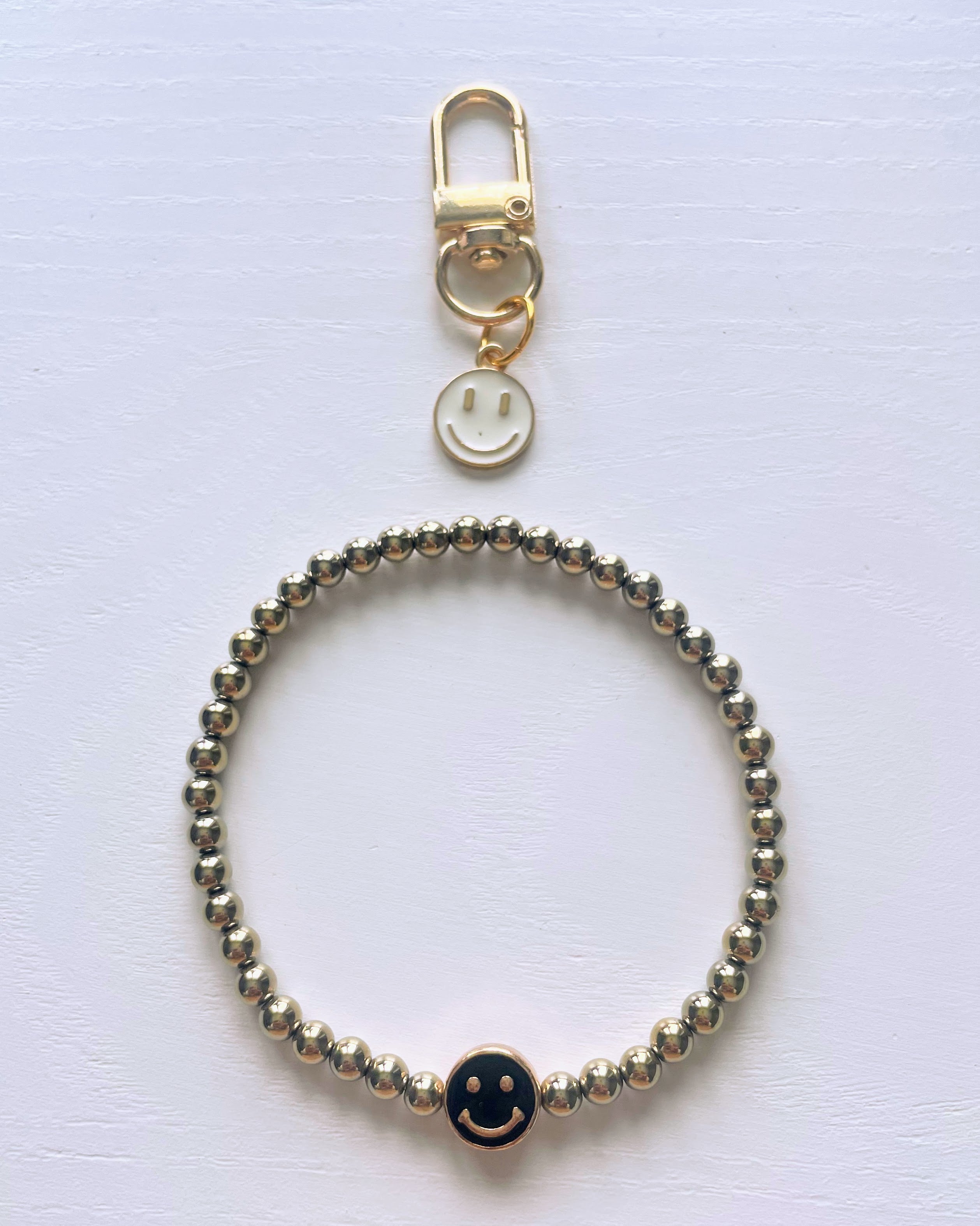 Hematite Bracelet with Smile Bead and Keycharm (A)